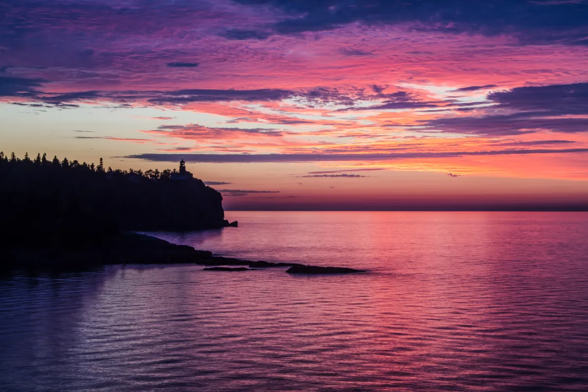 Split Rock Sunrise: fine art lakes photograph by J Grigg